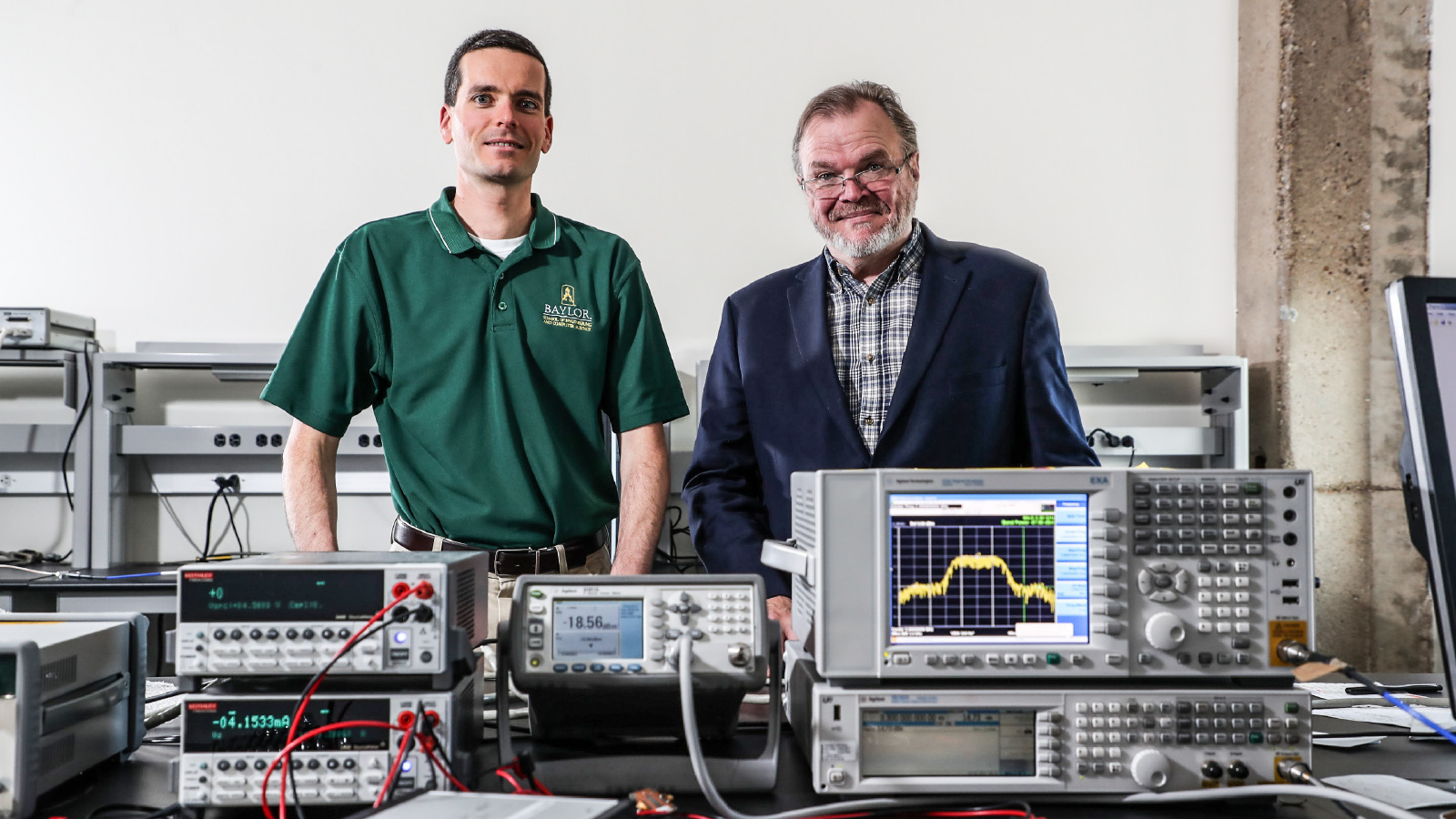 Dr. Charles Baylis, Associate Professor of Electrical and Computer Engineering and Dr. Robert Marks, Distinguished Professor of Electrical and Computer Engineering