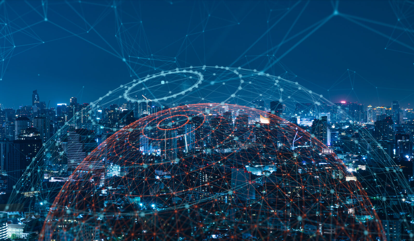 Modern city with wireless network connection and city scape concept.Wireless network and Connection technology concept with city background at night.